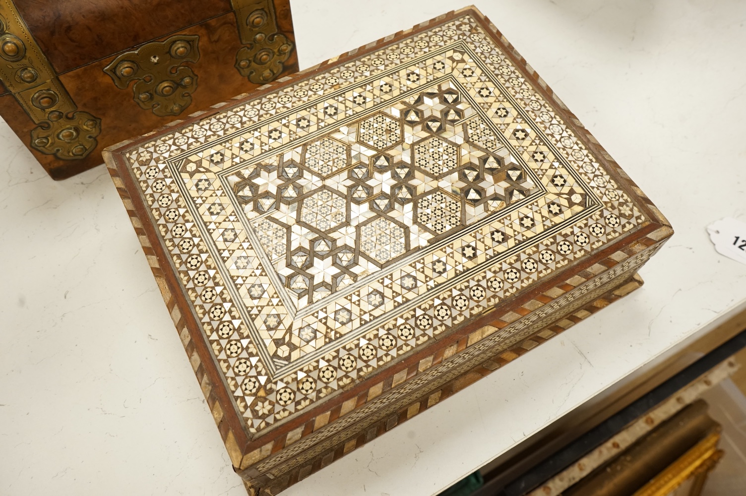 A brass mounted walnut dome topped box and another bone and mother of pearl inlaid box, 32 x 25cm
